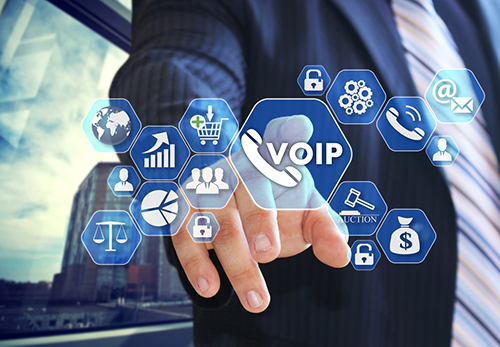 The businessman chooses VOIP on the virtual screen in social network connection.